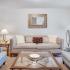 Living woom with couch and chairs